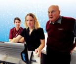 Lab work: Dr. Bruce Becker,

at right, collaborates with members of his research team as they

conduct immersion studies at Washington State

University.