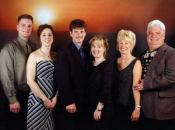 Thicker than water: Greg Hoover Jr. (far

left) and his brother, Scott (middle), purchased Midwest Fiberglass

Pool Distributors from their father, Greg Sr. (far right), in 2006.

The siblings subsequently split the company into two separate

firms, while Greg Sr. established a new pool business in Sebring,

Fla. They’re shown here with their

spouses.