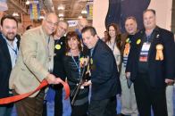 Show Chairman/NESPA Vice President Kyle

Chaikin (with scissors) kicks off the event with a ceremonial

ribbon cutting. He is joined by (L-R) Past President Rob Romano;

Treasurer John C. Migliaccio; APSP President Steve Gorlin; Long

Island Chapter Administrator Karen Pinto; immediate Past President

Clive Ensher; Nataliya Romano; APSP regional Director John Romano;

and President Robert Blanda.