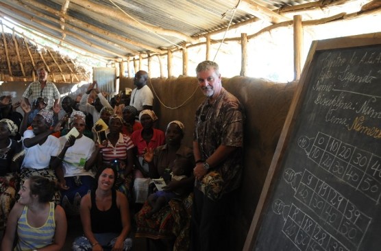Skip Phillips, far right, celebrating a service in a Mozambican village.