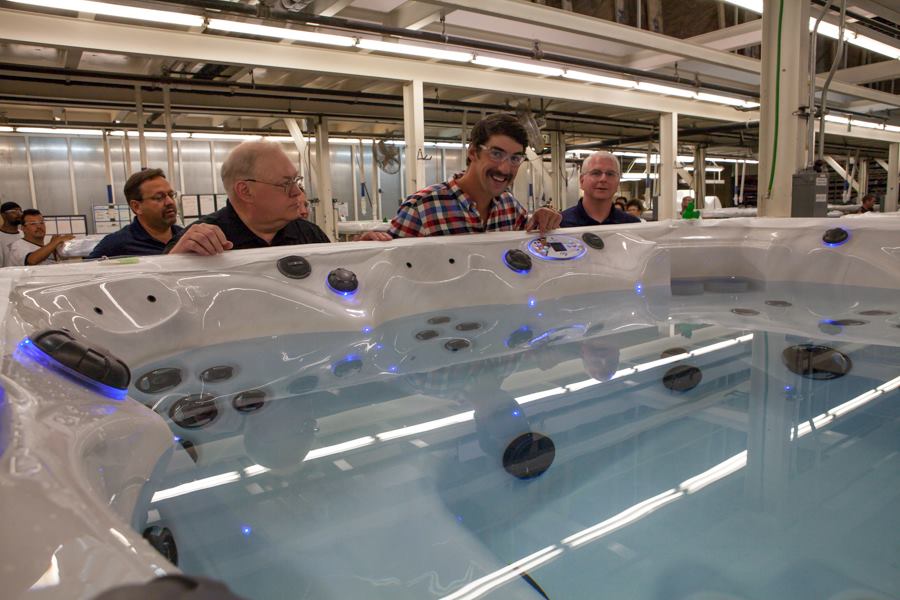 Splash around: During a recent tour of Master Spas’ manufacturing facility, Olympian Michael Phelps warmly greeted the workers on the production line. Phelps also attended dealer meetings and energized the retailers.