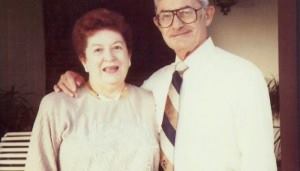 Pool industry pioneer, Leon Bloom, poses with his wife Dorothy.