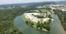 The Leisure Pools facility is set on a large island in Tennessee, with the French Broad River flowing around it.