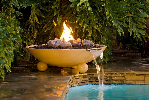A fire element can add a spark of drama to a poolscape.