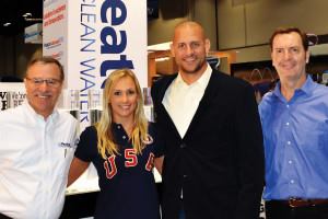 Looking ahead to the 2016 Games: Celebrating the renewed sponsorship deal are (L-R) Howard Smith, CEO, Pleatco; Mariya Koroleva, USA Synchro National Team; Kevin Warner, CEO, USA Synchro; and Battista Remati, CMO, Pleatco. (Photo: Pleatco, LLC)