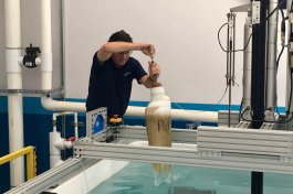 AquaStar Pool Products’ director of science and compliance, Steve Barnes, uses the apparatus for testing drain covers for hair-entanglement hazards.