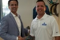 Premier Pool Service President Charles Lauller (right) with Tim Lawrence, director of sales for NC Brands.