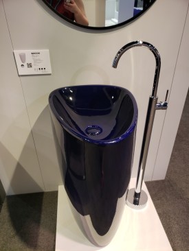 The Etna monoblock pedestal lavatory sink, shown here in Sapphire Blue, on display at the 2020 Kitchen & Bath Industry Show.