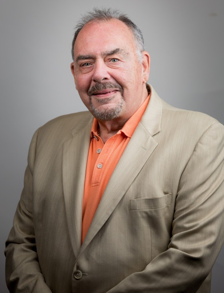 John Romano1948-2022