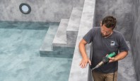 An installer easily welded-in the designer PVC membrane to create the pool’s natural stone-like finish