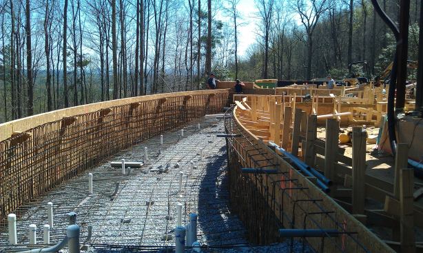 When you build a vanishing-edge wall that long, your main concern is its structural integrity. It’s not about the weight of the water, it’s about the expansion and contraction of the concrete. It becomes more like a dam. It’s the same consideration that an engineer goes through when he’s designing any large concrete structure. Thermal expansion becomes one of your major design parameters. So there is a lot of steel – no. 5 bars at 4- or 6 inches on center.