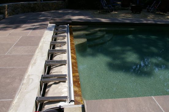 Many of John Viola’s clients request hidden vault lids when they order their covers. The photo shows an example of a vault open up for cleaning. Accumulated debris should be removed at least once a year.