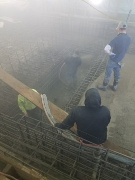 Crews working on the underwater cover box.