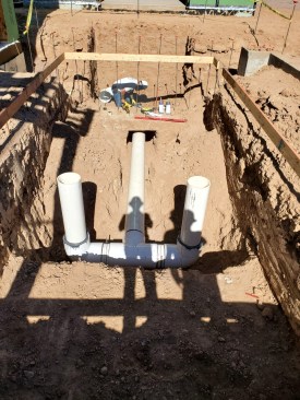 Crews broke ground on the master bedroom swim spa. Here, they can be seen placing the 12-inch plumbing for the current system.