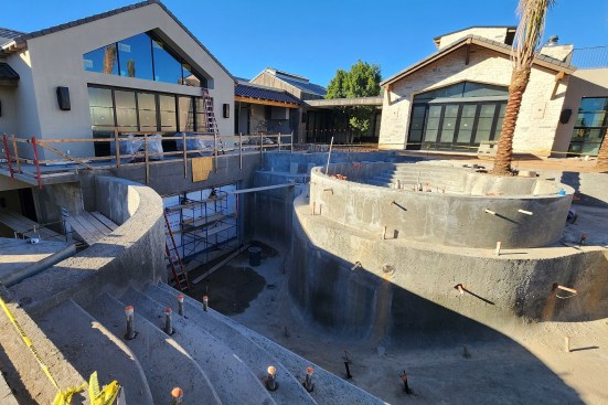 The palm trees were set in place early in the process, when access was more clear. 