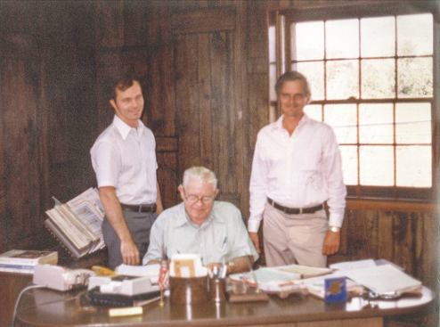 Triumphant: Since 1955, W.W. Adcock has provided distribution services from its Pennsylvania base. In this 1980 photo, founder Woodrow W. Adcock (seated) is joined by sons Dee (left) and Dale. 