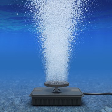 Aeration can raise pH without affecting alkalinity. Here, an air pump is connected to an air stone, like those in aquariums. But pros can simply introduce aeration by repositioning inlets or operating waterfeatures and vanishing edges.