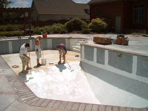 Stain Barrier rolls on like paint. Pros are careful to cover the entire surface of the vessel including all seams between panels. 