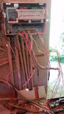 Before: This retrofit involved a crazy number of wires to reconnect to control the pool equipment and low-voltage landscaping lighting.