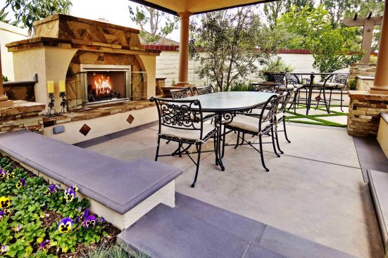 When confronted with the challenge of limited space, Conscious Environments employed another trick that appeared to add more size to this backyard project in California: the designer sank the covered Spanish-style pergola at a lower level than the rest of the area, which makes the space feel bigger.  