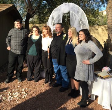 Garrett and wife Shawna, center, on their wedding day in 2015. They are flanked by Garrett’s children, from left, Shawn, Brenna, Kellie and Allie.
