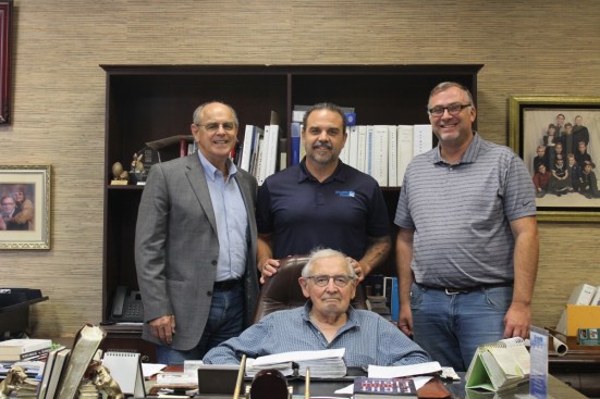 Standing left to right: Shasta CEO Skip Ast Jr.; Director of Sales Skip Ast III; and Director of Poolcare and Outdoor Environments Dave Lewis. Seated: Founder Skip Ast Sr.