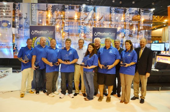 Pleatco expanded its awards program to include seven winners in 2016. Pictured left to right: Todd Riddick, Backyard Hero Award; Mark Howard, Big Heart Award; Jason Lehmann, Industry Leadership Award; Perfect Pool Guy Cory Eagles; Pleatco CEO Howard Smith; Erin Thibodeau, Outstanding Service Award; Brian Van Bower, Genesis; Douglas Hoerber, Lifetime Achievement Award; Skip Phillips, Genesis; Perfect Pool Gal Jennifer Del Vaglio; and Thomas Lachocki, NSPF.