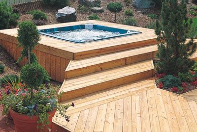 With the right design, a

wood deck can help turn a well-placed portable spa into a luxurious

destination spot in any yard.