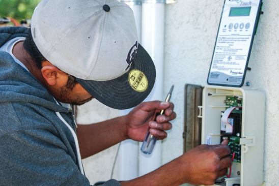 11) Electrical lines are run into the new control box on the side of the house.