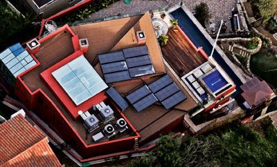 Equipped with radiant heating, solar hot-water systems and recycled denim cotton insulation panels, this house and pool use the most advanced and environmentally conscious technology.