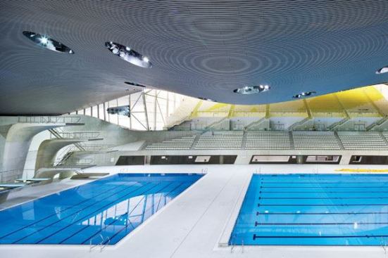 Design DetailsLike its predecessor the Water Cube, the London Aquatic Centre is designed with an eye toward aquatics and the fluidity of water in motion, but it avoids cliché. Sulfur yellow, one of the official London 2012 brand colors, was used to accent the gray stain applied to the building to give it a consistent, weathered-finish look. Succumbing to using the blue associated with pools would have been too obvious, says the designer.