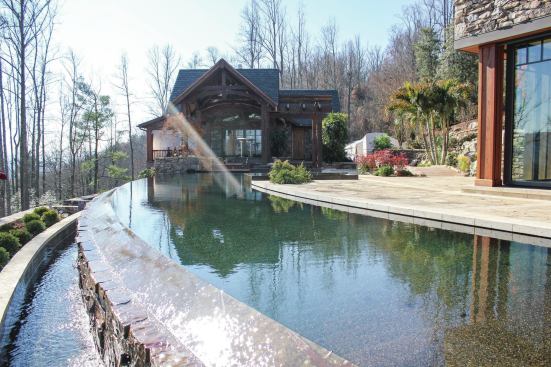 Dorsey wanted to make the pool look as full as possible, with very little freeboard — that dry space on the wall between the water’s surface and coping. To achieve this, he had a coping custom-made. Measuring only 1 inch deep where it sits over the bond beam, it is approximately 2-1/2 inches thick where it hangs over the water. This helps visually close the gap between coping and water.